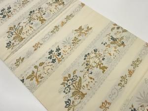 変わり横段に草花・動物模様織出し袋帯